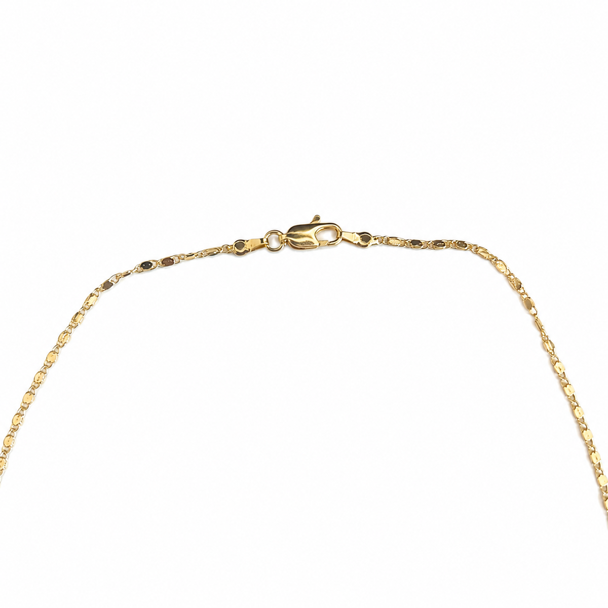 Collar con dije de cruz en forma de lágrima en tono dorado medianoche