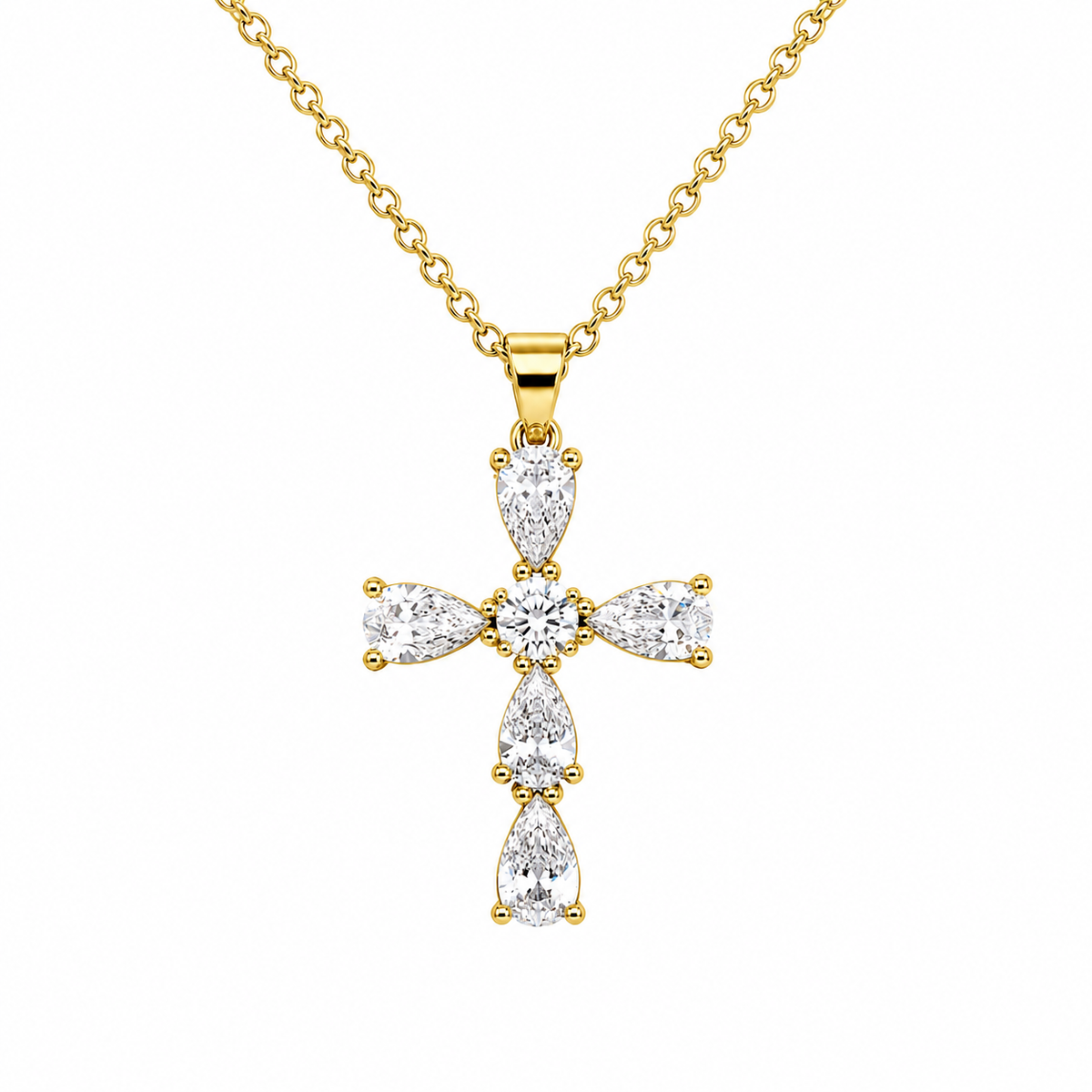 Collar con dije de cruz en forma de lágrima de circonita cúbica en tono dorado