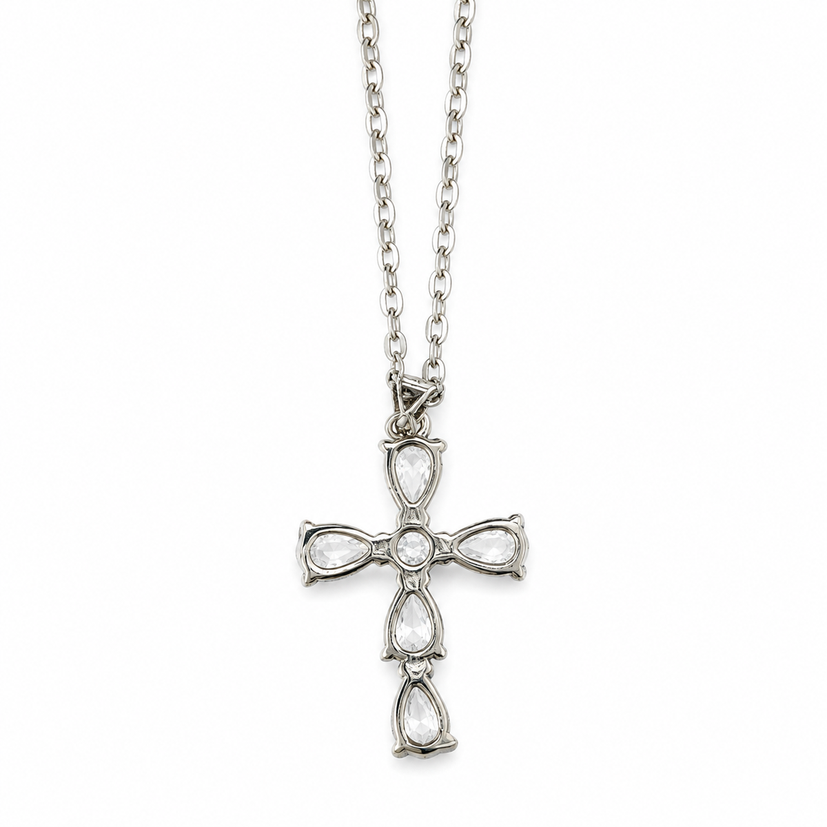Collar con dije de cruz en forma de lágrima con circonita cúbica, color plateado