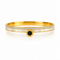 Gold Tone Bangle With A Mother Of White Pearl