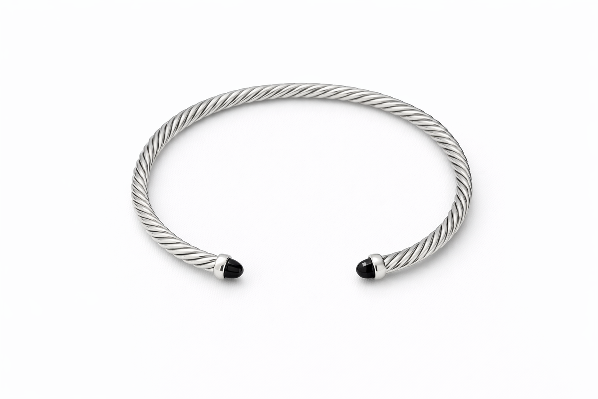 Pulsera Cablespira de plata con cúpulas de ónix negro